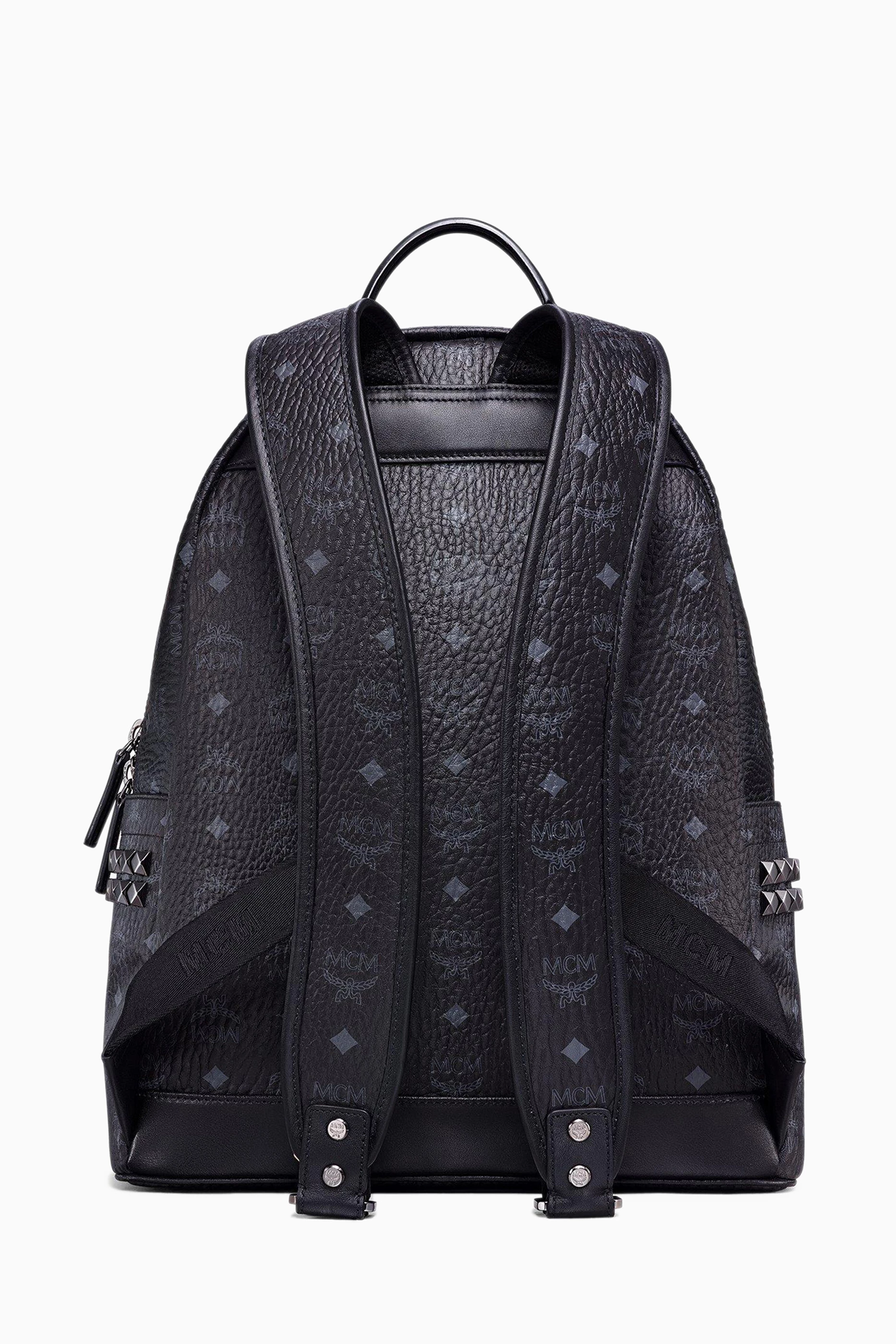 Black mcm backpack with studs deals