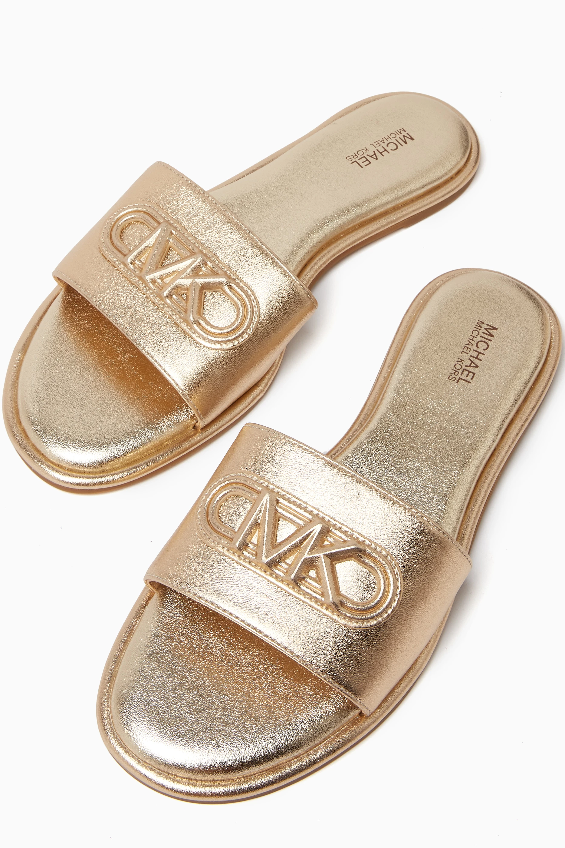 Buy Michael Kors Gold Saylor Slide Sandals in Metallic Leather For