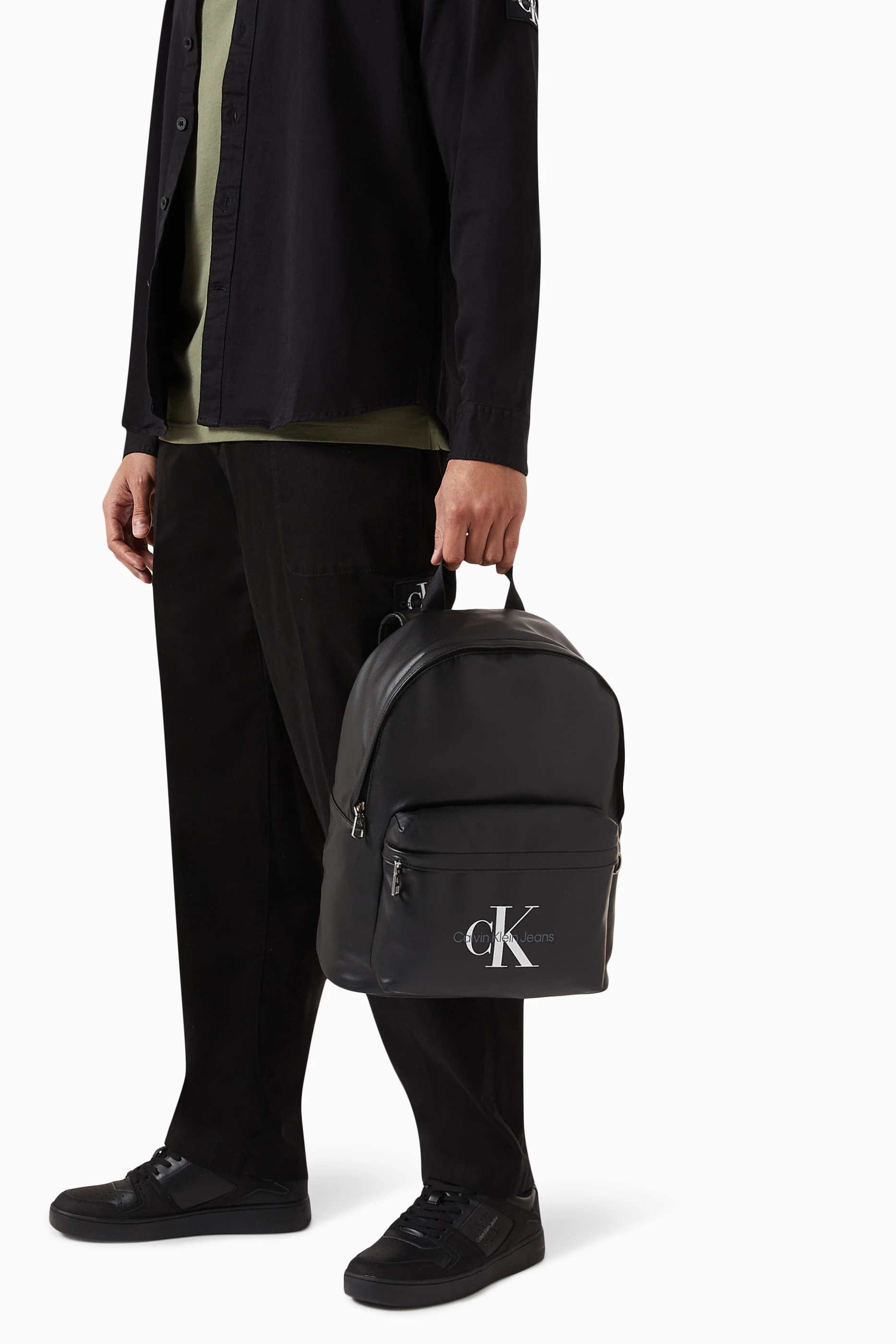 Buy Calvin Klein Jeans Black Monogram Logo Backpack in Faux 