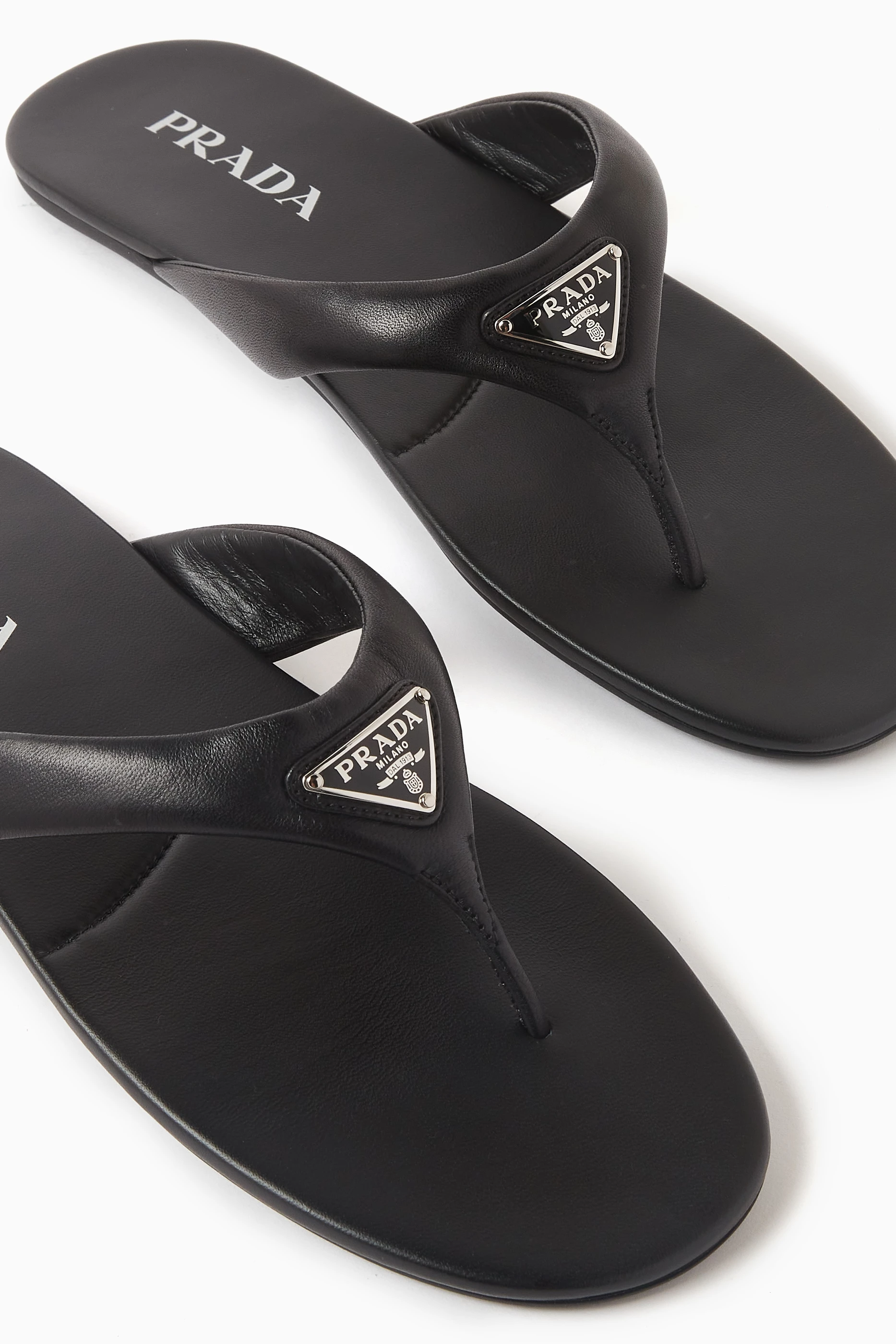 Prada logo flip flop deals