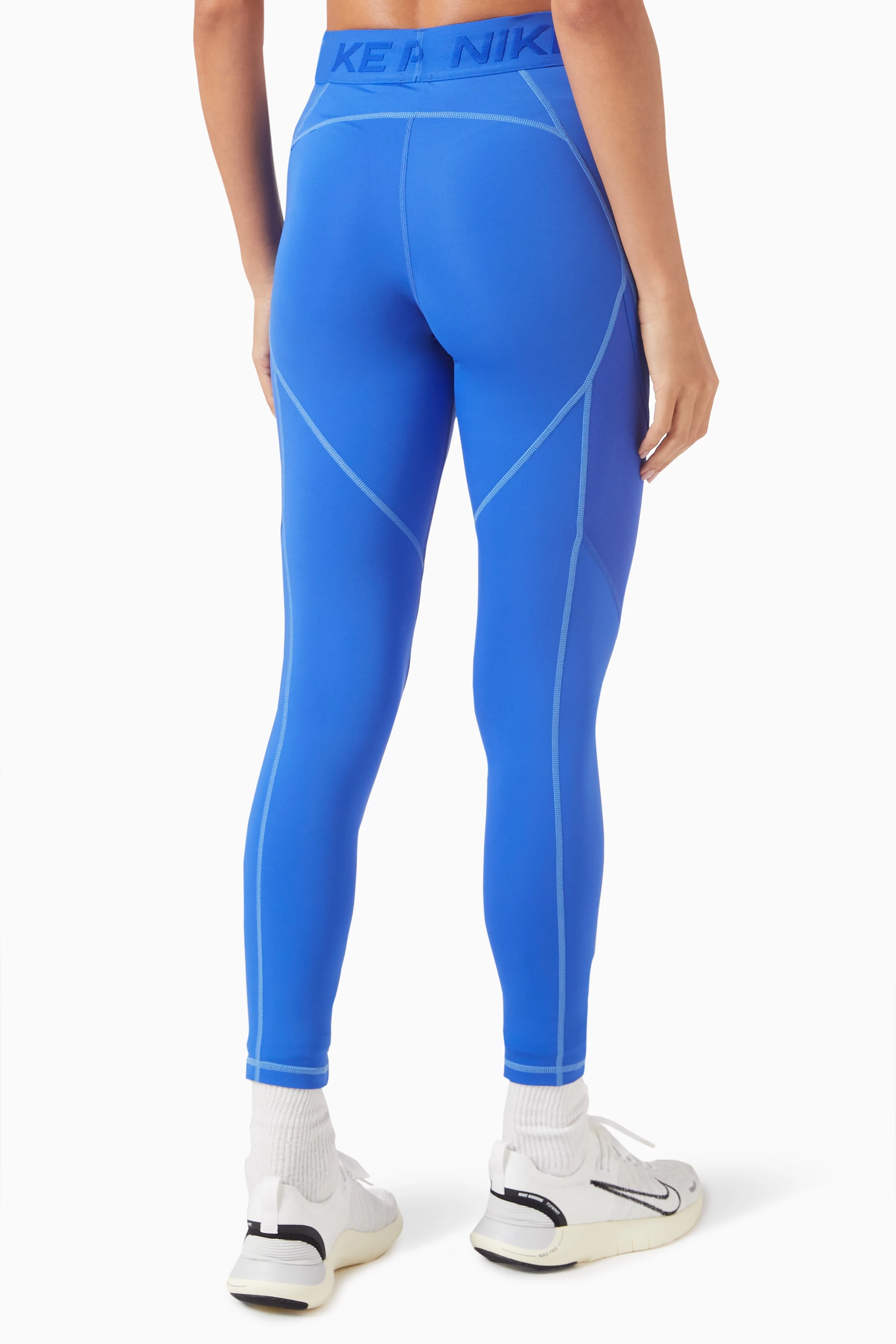 Buy Nike Blue Pro Dri fit Novelty 7 8 Leggings For Women Online Ounass Saudi