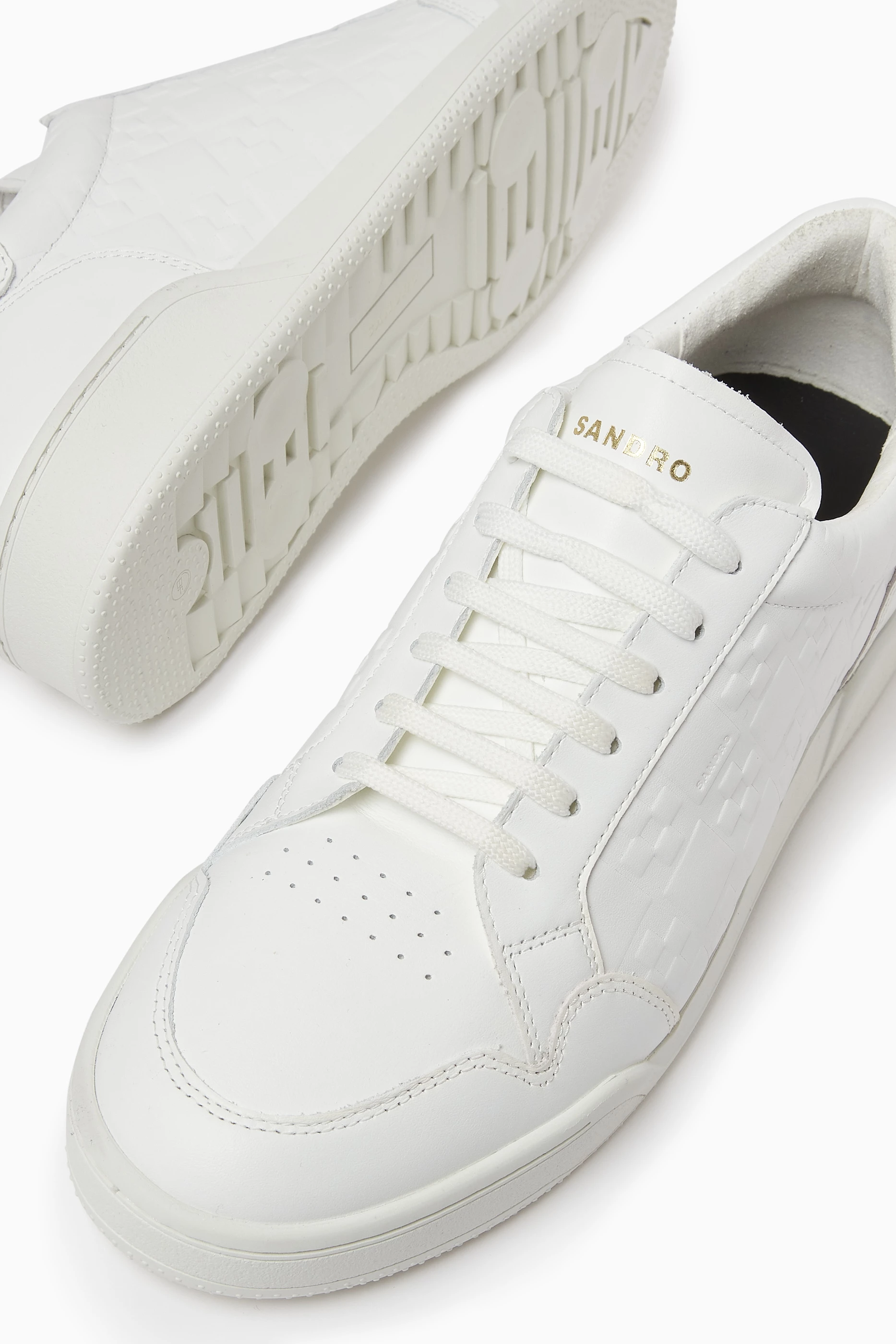 Buy Sandro White Embossed Sneakers in Leather For Men Online Ounass Saudi