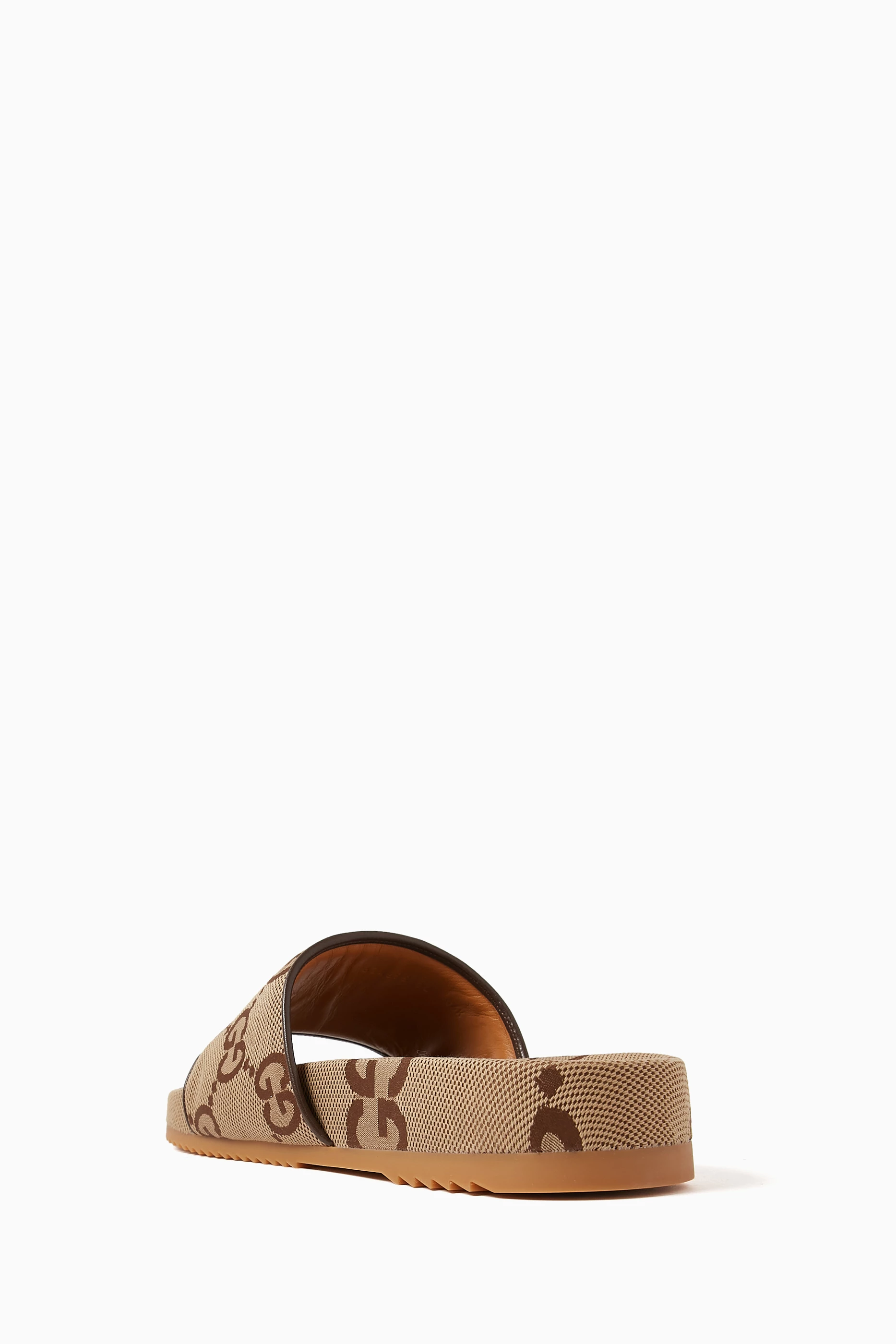 Buy Gucci Neutral Maxi GG Slide Sandals in Canvas For Men Online Ounass Saudi