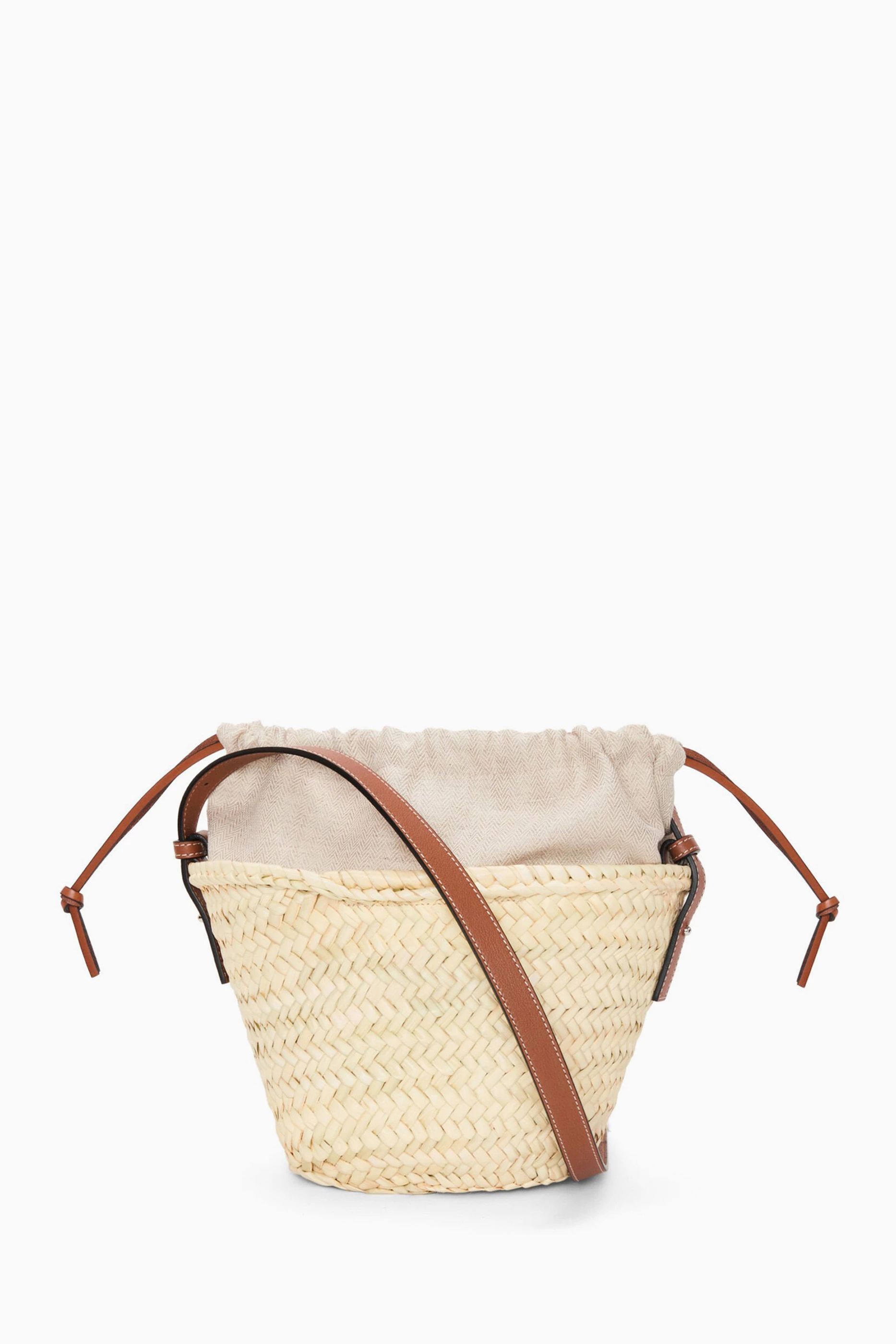 Buy LOEWE Neutral x Paula s Ibiza Drawstring Bucket Bag in Palm Leaf For Women Online Ounass Saudi