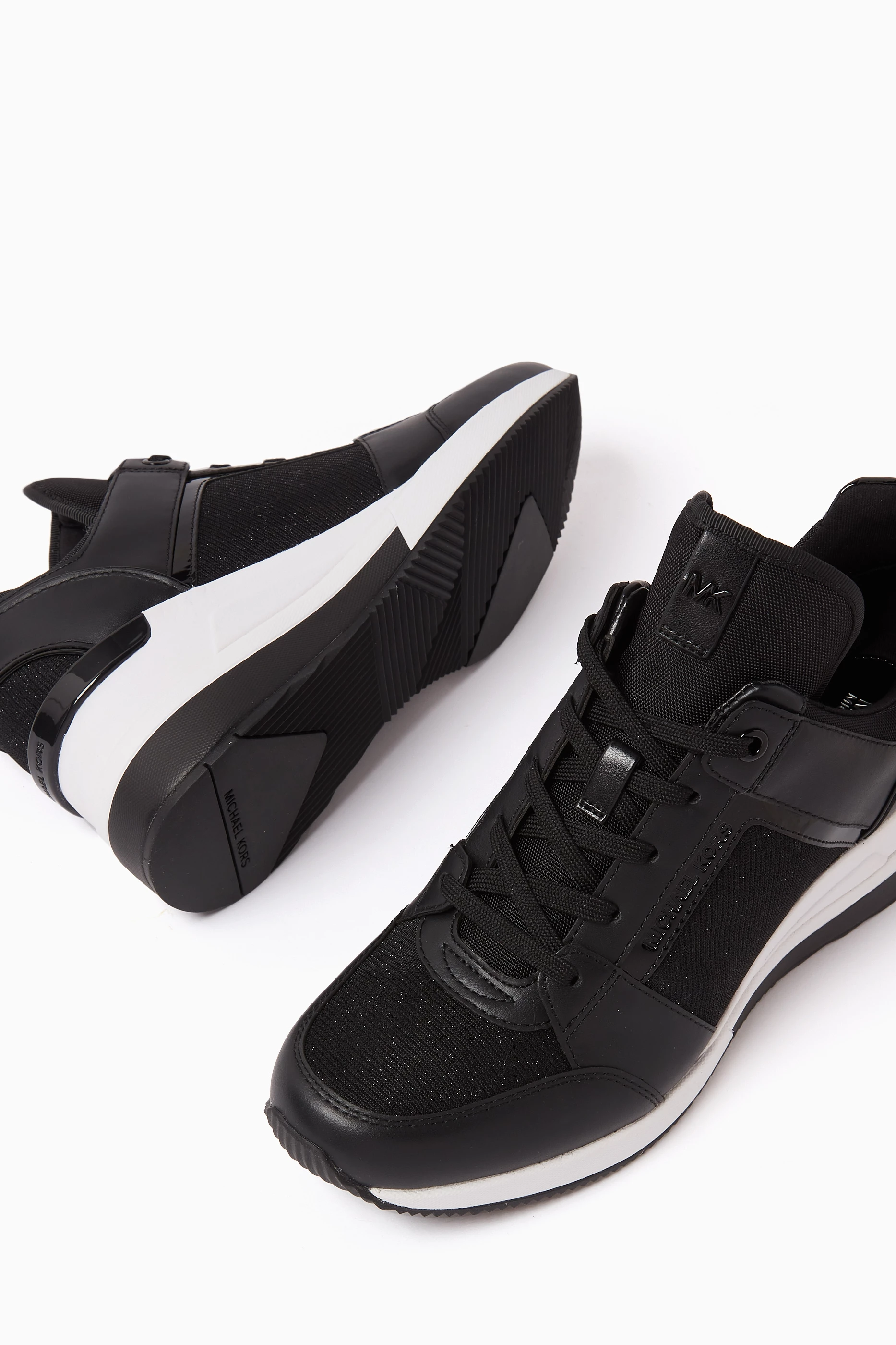 Buy Michael Kors Black Georgie 65 Wedge Sneakers in Leather Mesh For Women Online Ounass Saudi