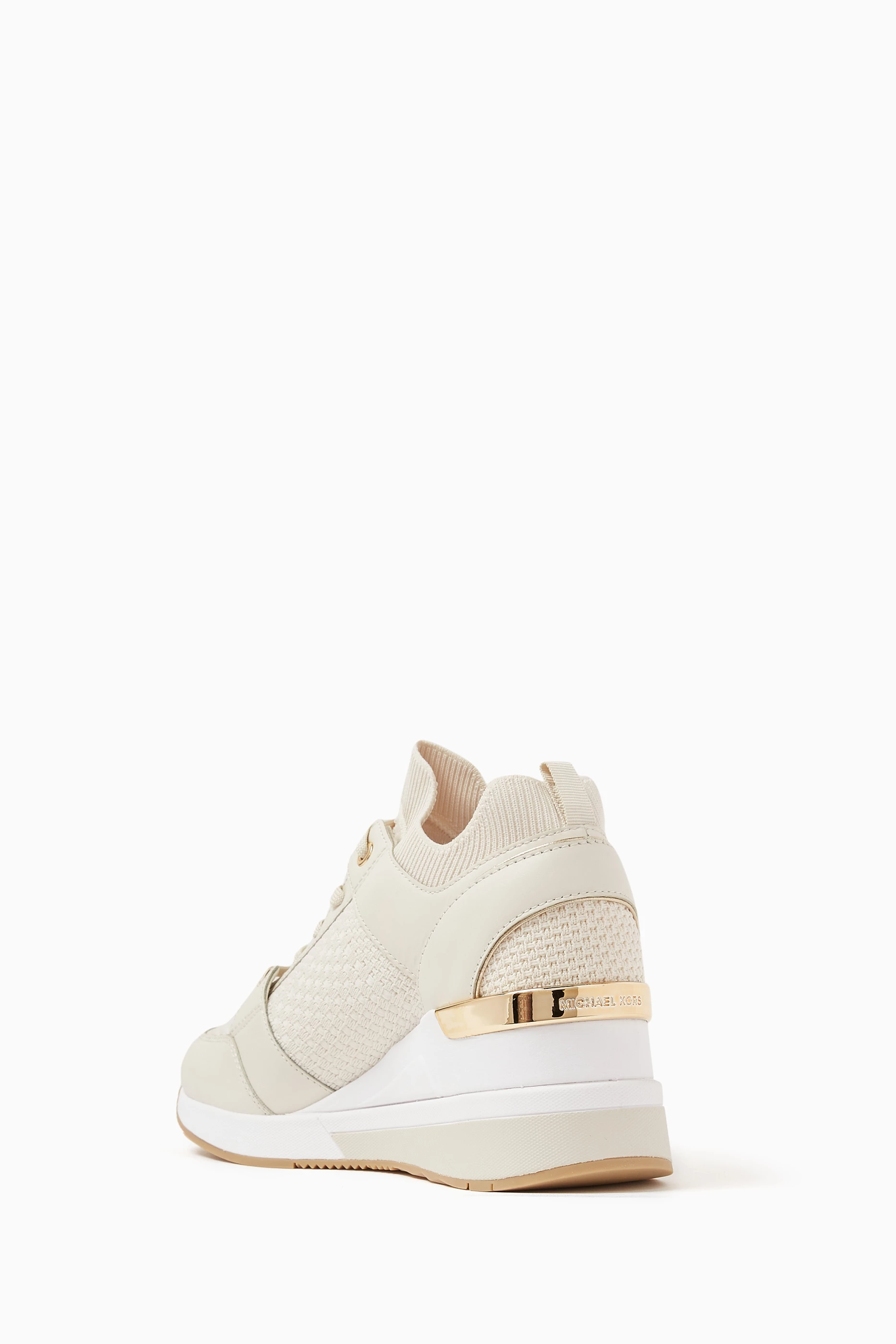 Buy Michael Kors Neutral Georgie Wedge Sneakers in Knit Leather For Women Online Ounass Saudi