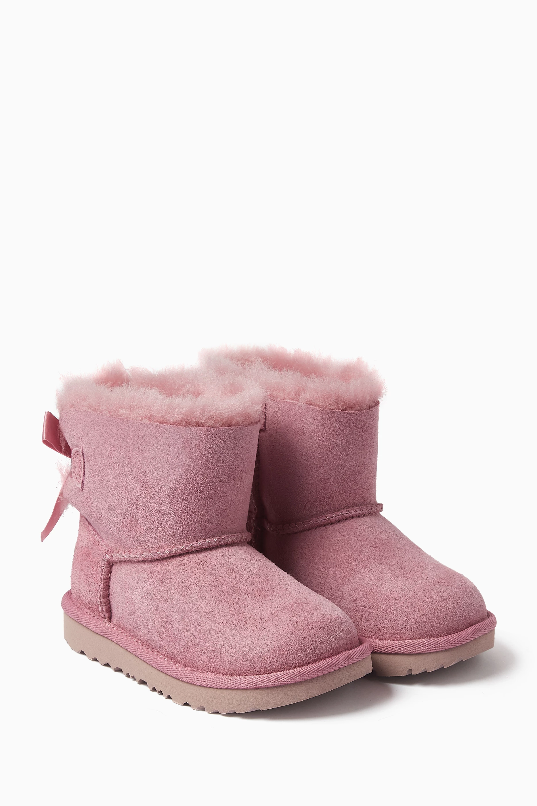 Pink ugg bow boots cheap