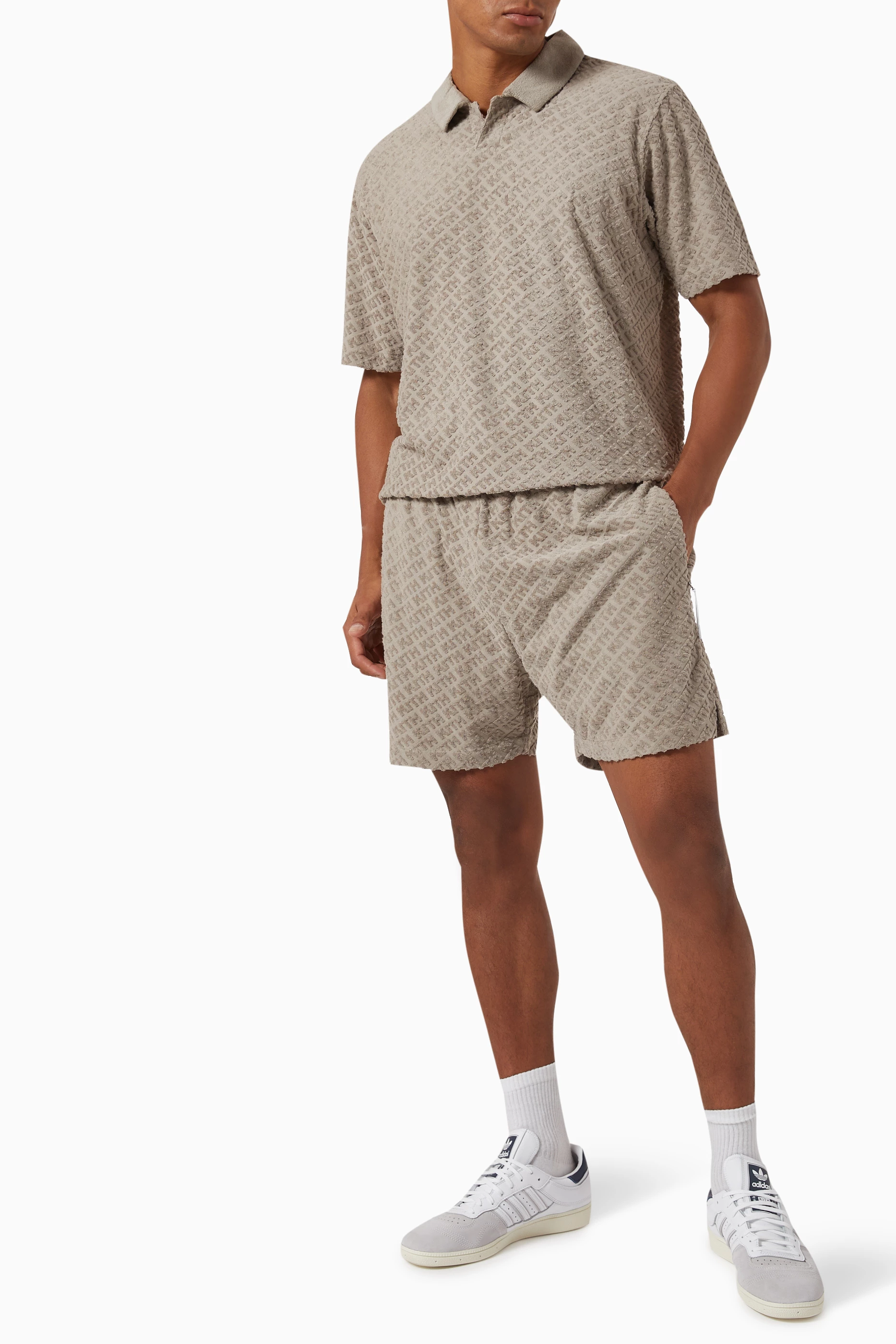 Buy Kith Neutral Italic Monogram Leo Polo Shirt in Towel Terry For Men  Online | Ounass Saudi