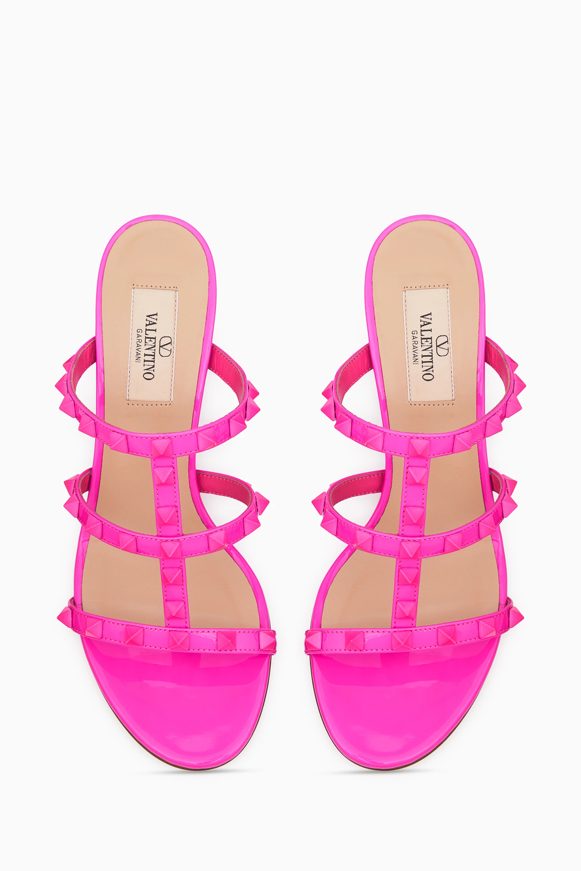 Buy Valentino Garavani Pink Valentino Garavani 60 Rockstud Patent Mules in Leather For Women Online Ounass Saudi