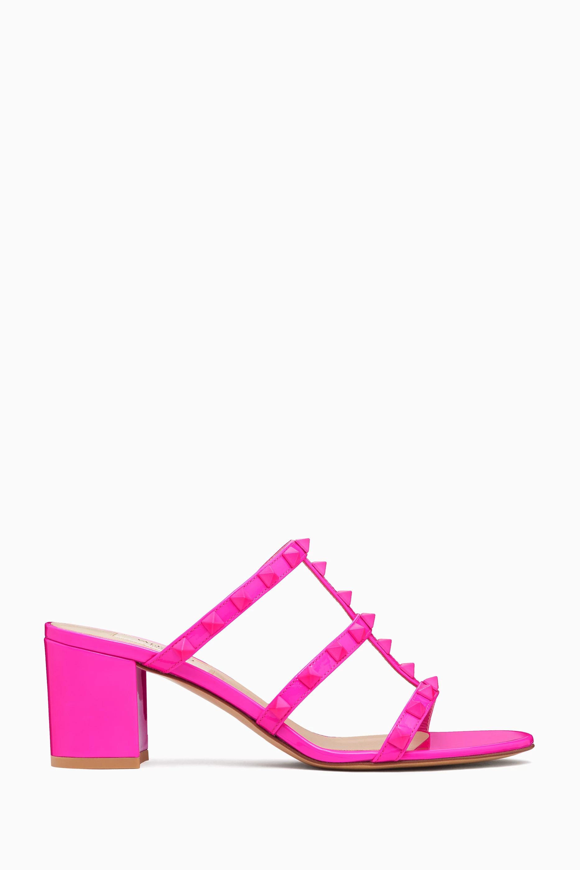 Buy Valentino Garavani Pink Valentino Garavani 60 Rockstud Patent Mules in Leather For Women Online Ounass Saudi
