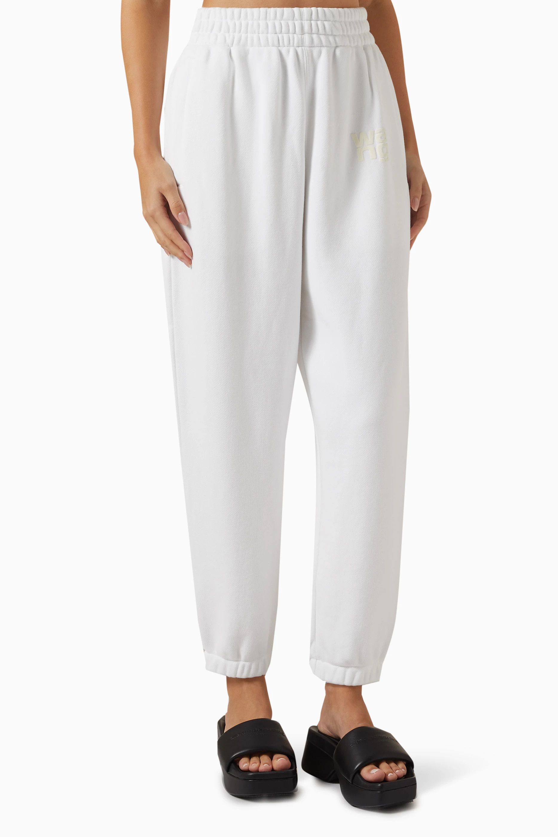 Buy Alexander Wang.t White Embossed logo Sweatpants in Cotton For Women Online Ounass Saudi