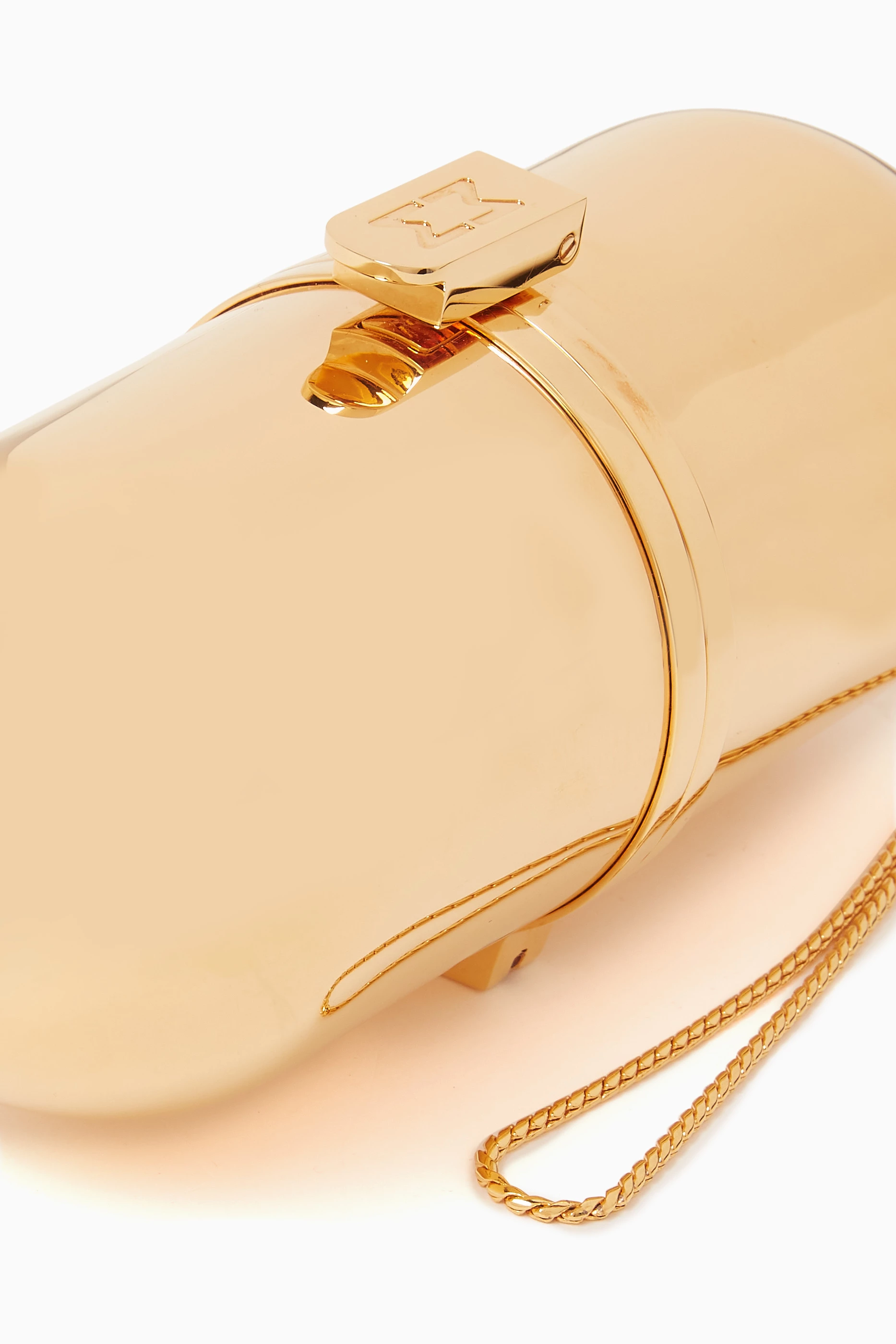 Buy Marzook Gold Pill Clutch Bag in Gold plated Brass For Women Online Ounass Saudi