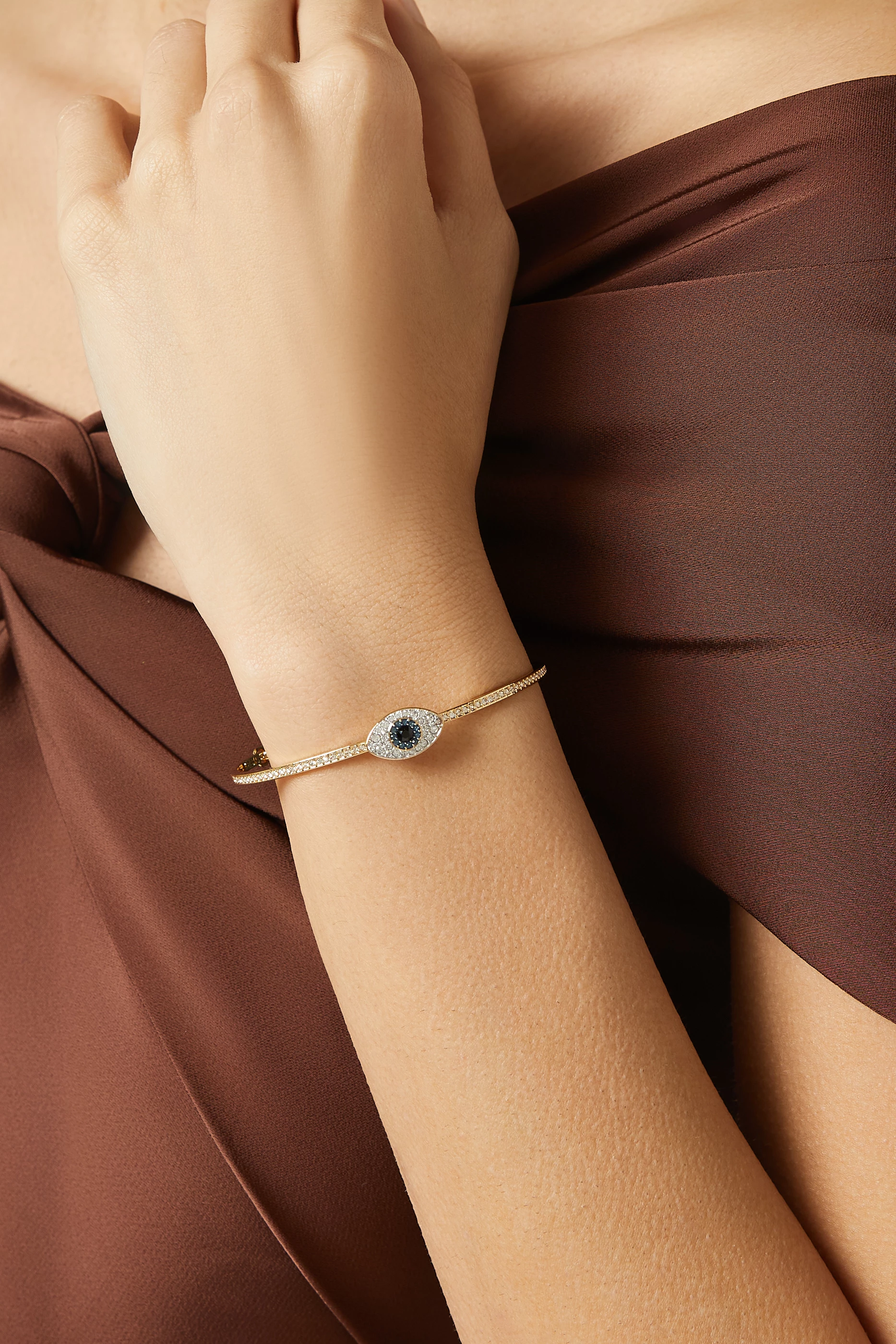 Buy Swarovski Gold Symbolica Evil eye Bangle in Plated Metal For Women Online Ounass Saudi
