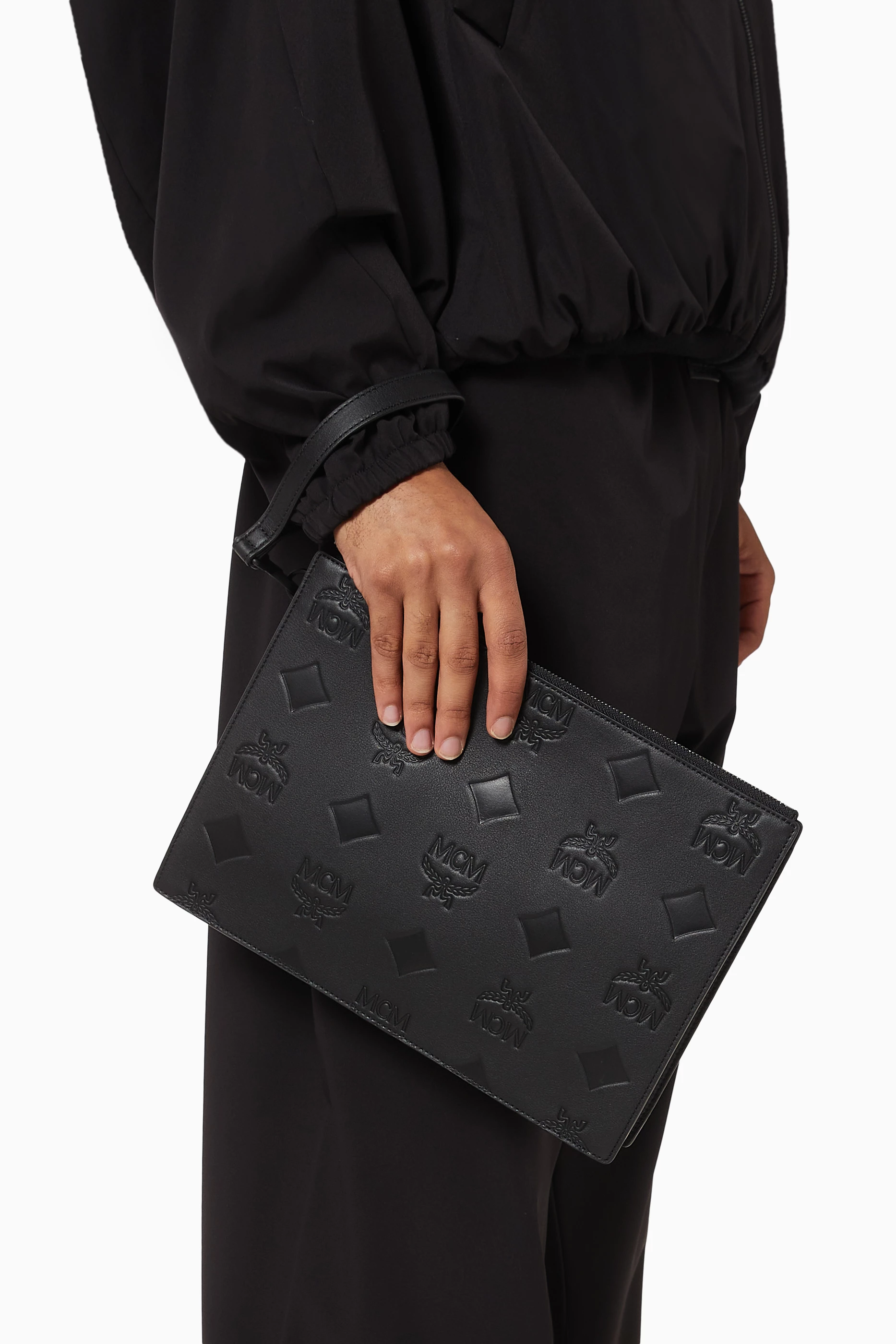 Buy MCM Black Aren Wristlet Zip Pouch in Maxi Monogram Leather For Men Online Ounass Saudi