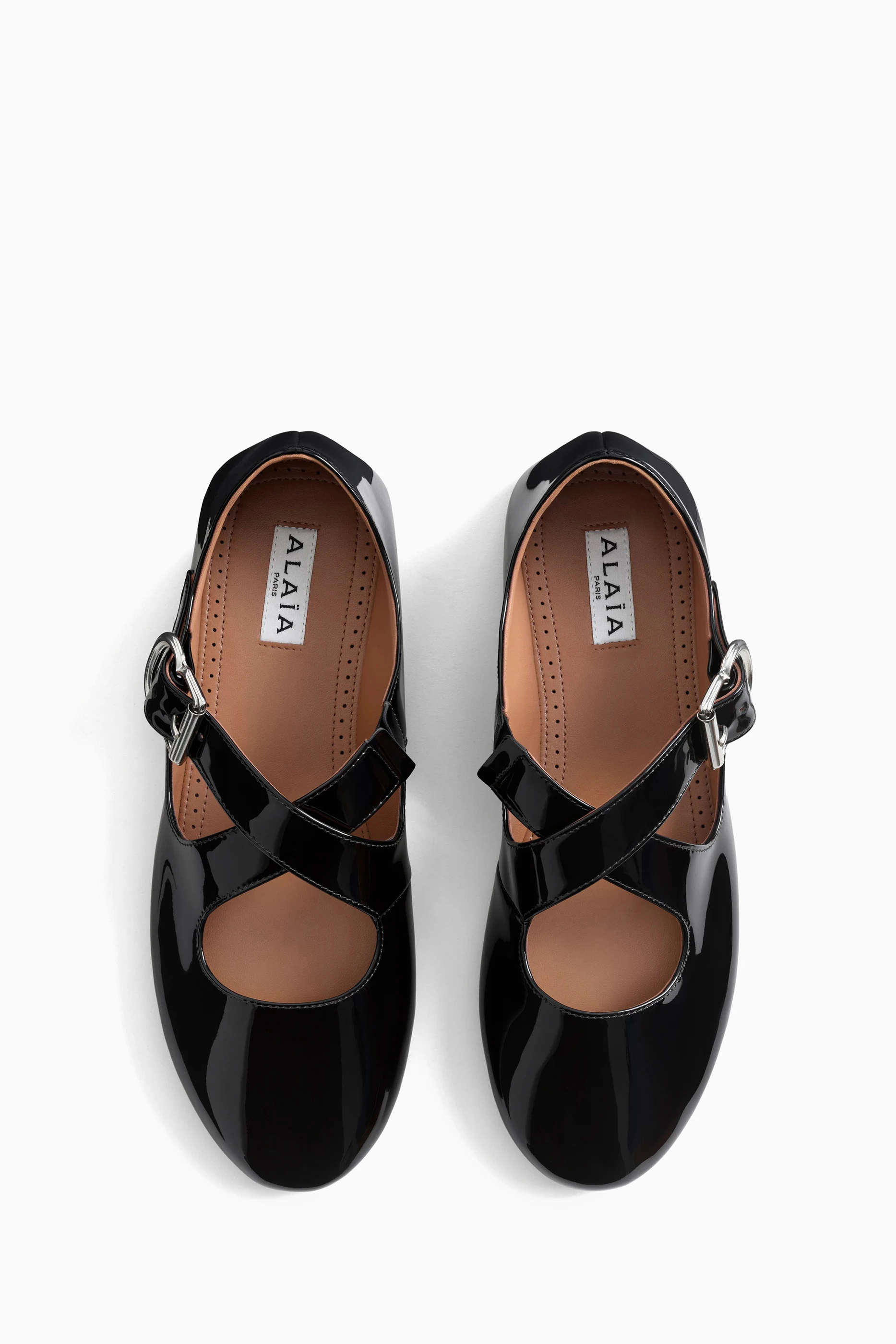 Buy Alaïa Black Criss-cross Ballet Flats in Patent Leather