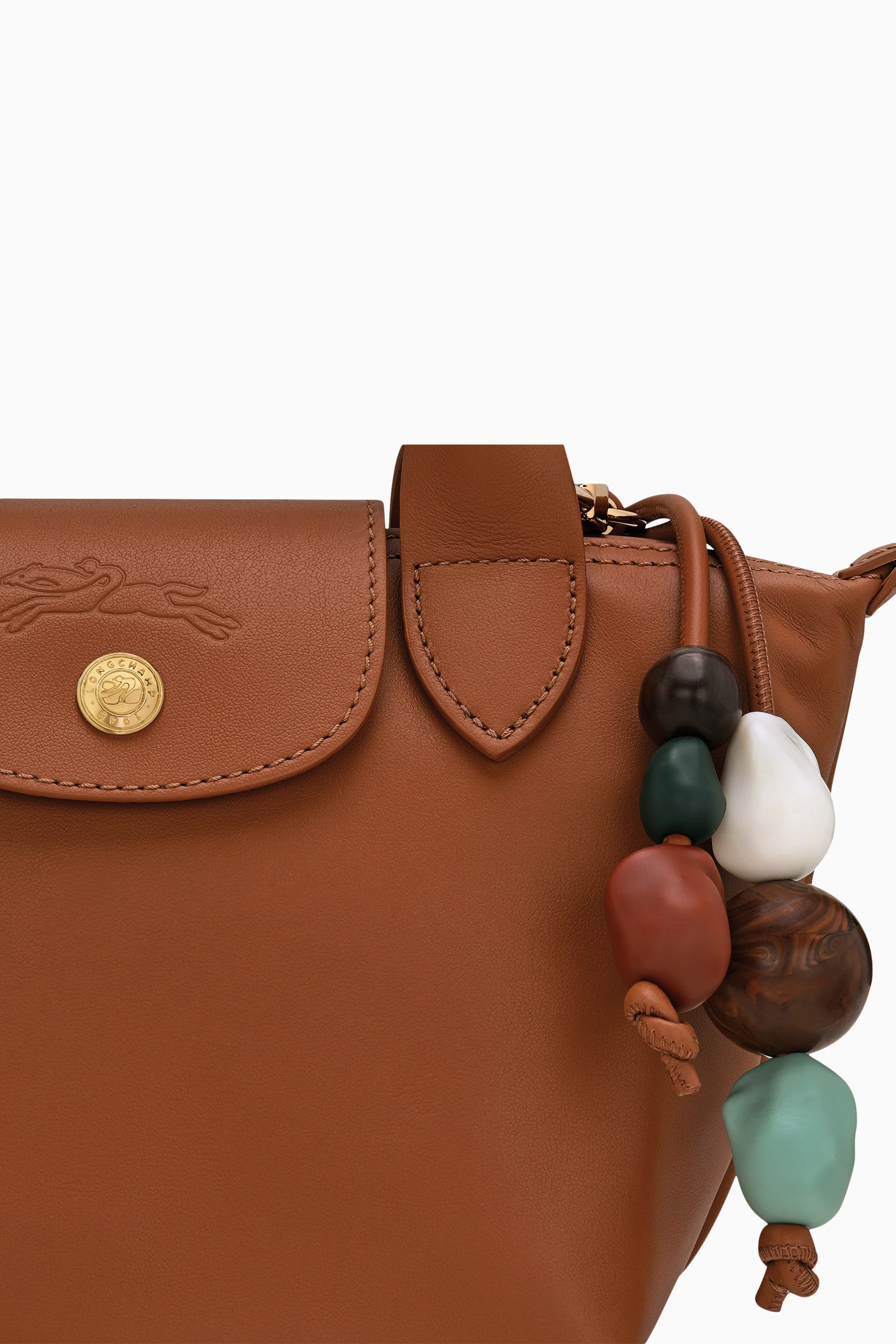 Buy Longchamp Brown XS Le Pliage Ceramique Bag in Leather For