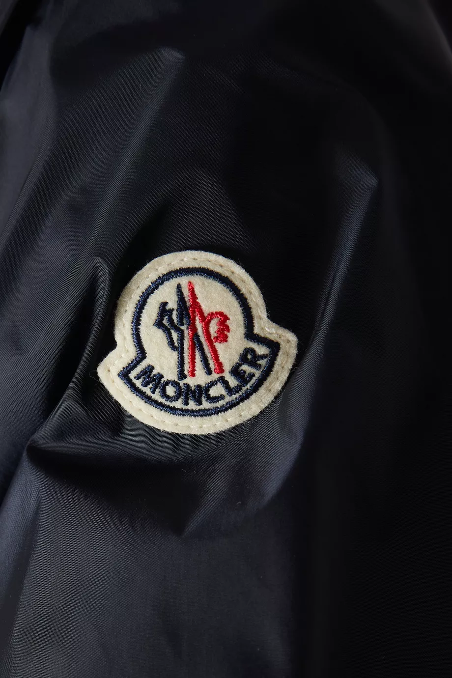 Moncler deals coat badge