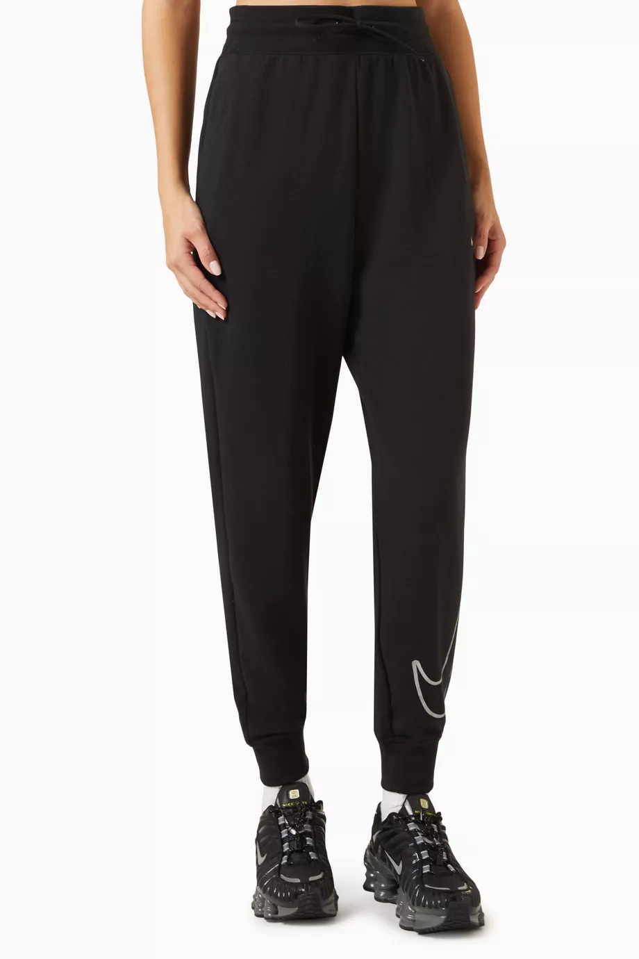 Buy Nike Black One 7/8 Graphic Pants in French Terry for Women in Saudi