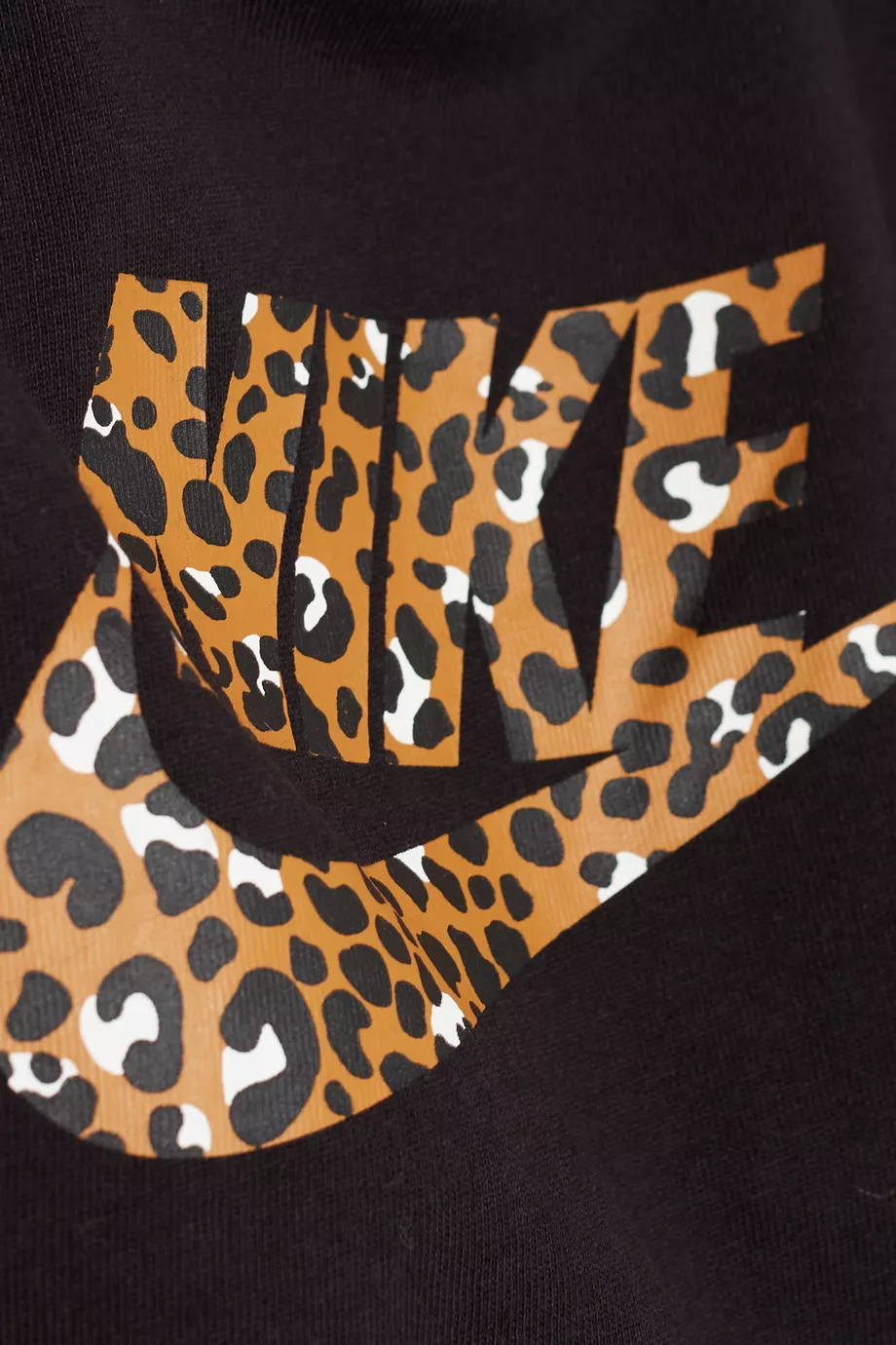 Nike cheetah print shirt discount