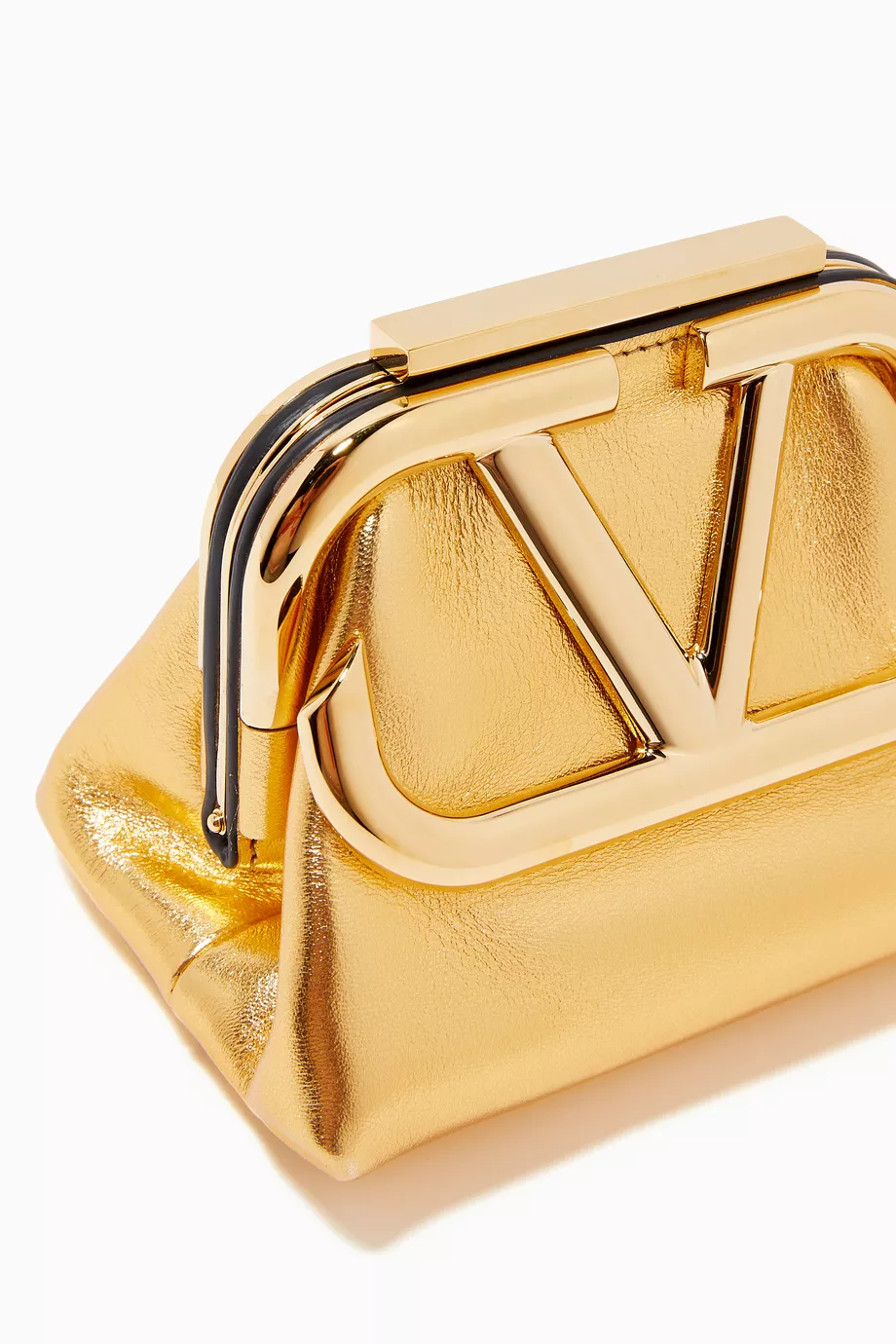 Buy Valentino Garavani Gold Valentino Garavani Supervee Clutch Bag in Metallic Nappa For Women Online Ounass Saudi
