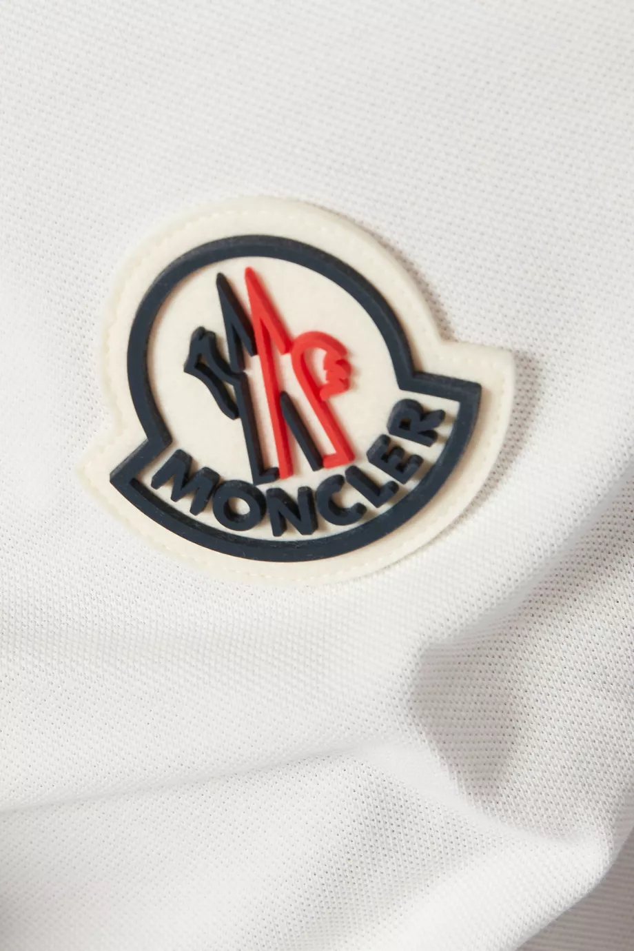 Moncler rubber badge best sale