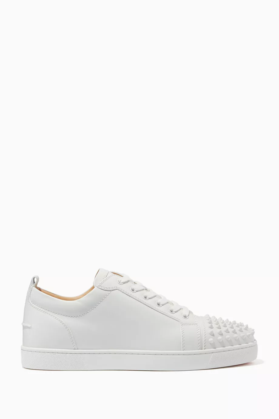 White sneakers with spikes hotsell