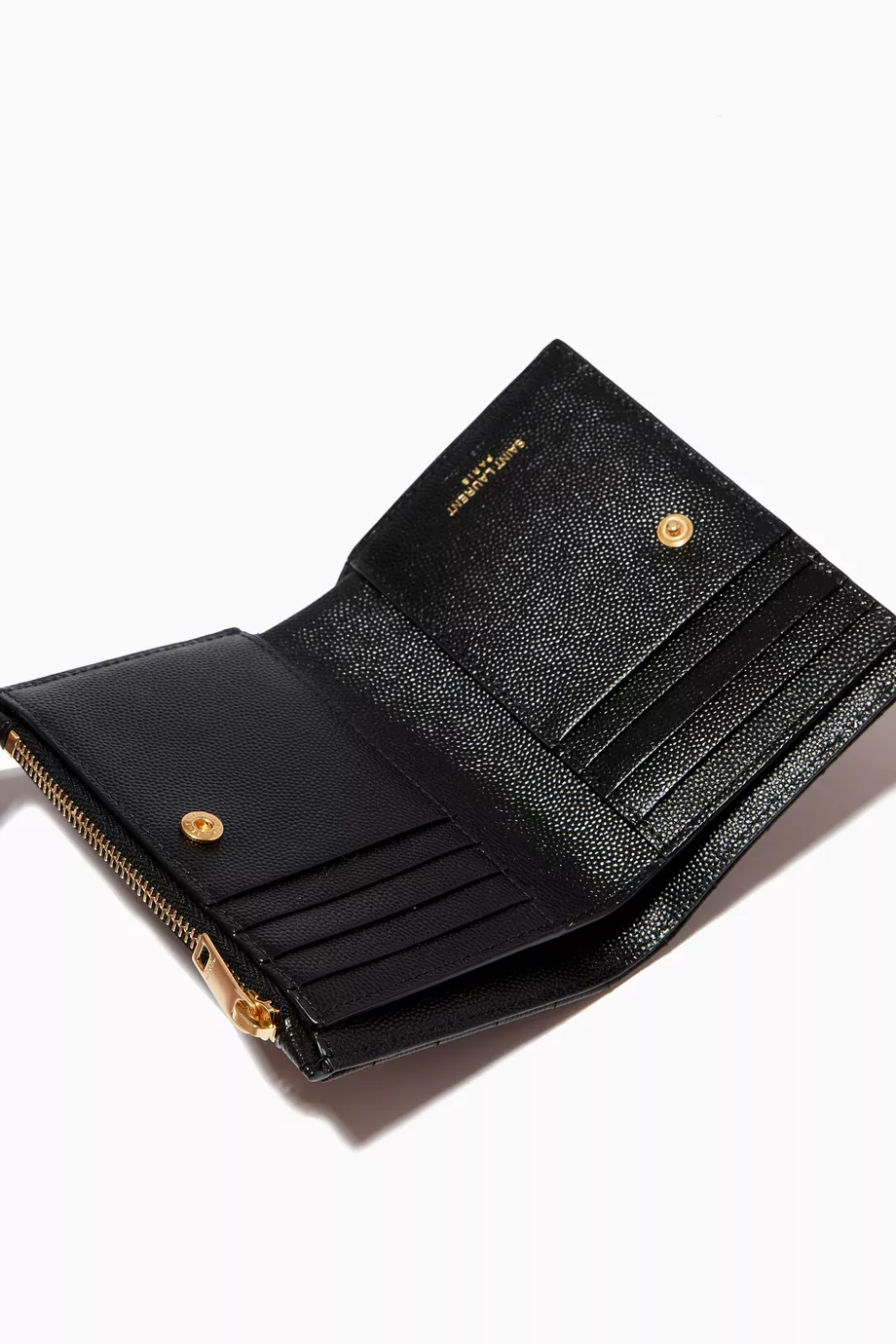 Buy SAINT LAURENT Black Cassandre Bi fold Zip Wallet in Matelasse Grain de Poudre Leather For Women Online Ounass Saudi