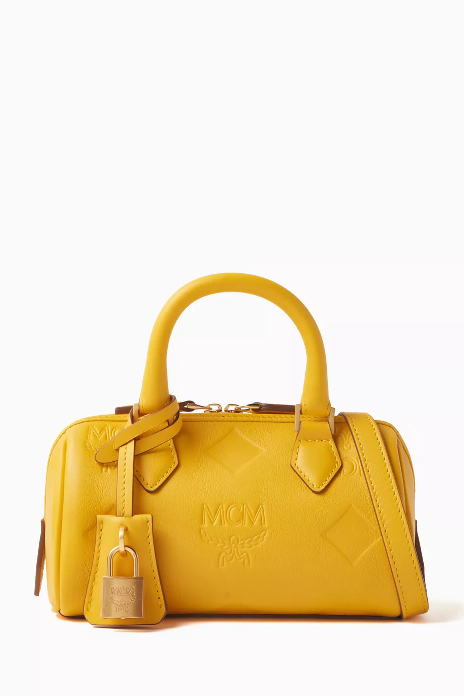 Mcm gold bag clearance