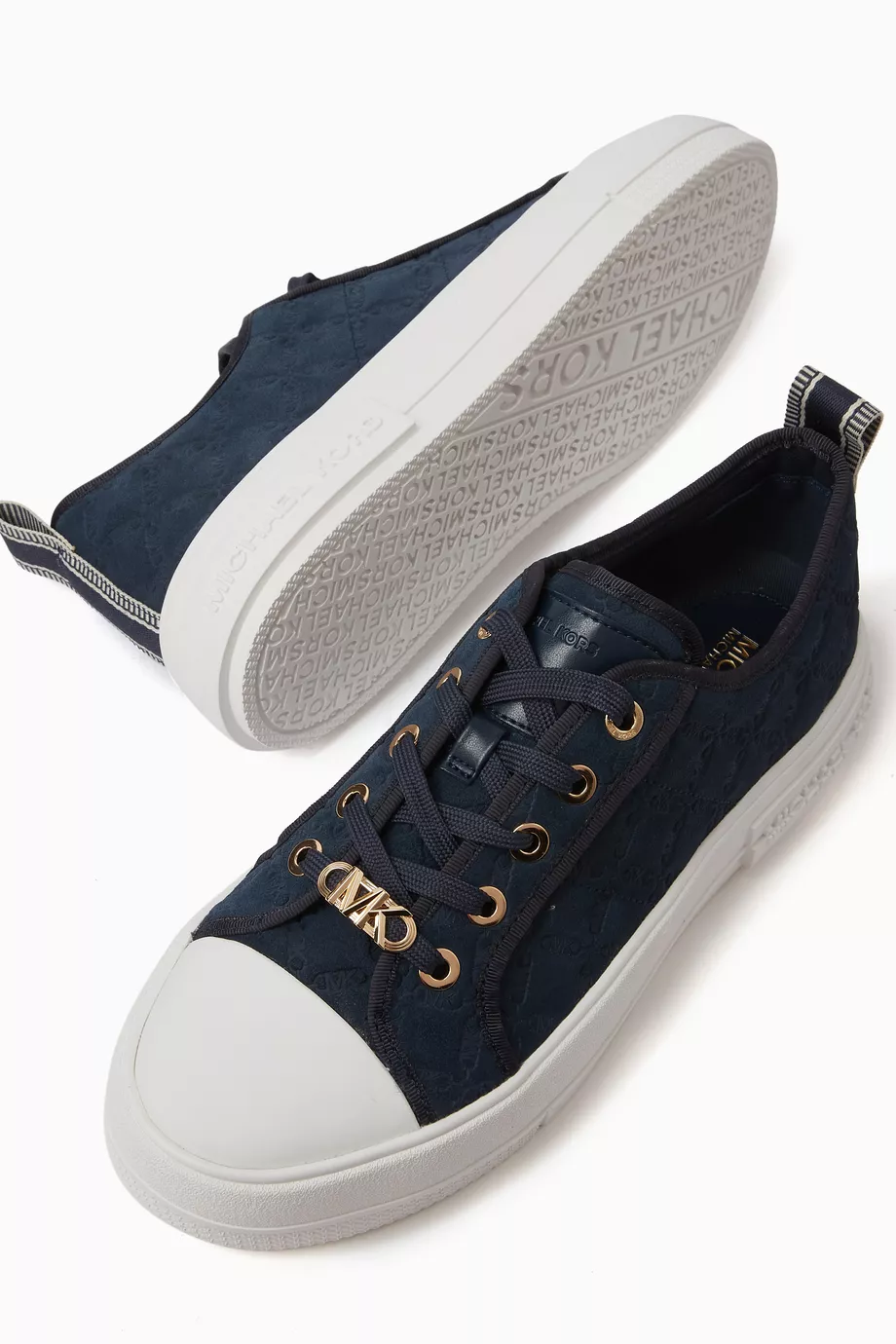 Buy Michael Kors Blue Evy Sneakers in Empire Logo Embossed
