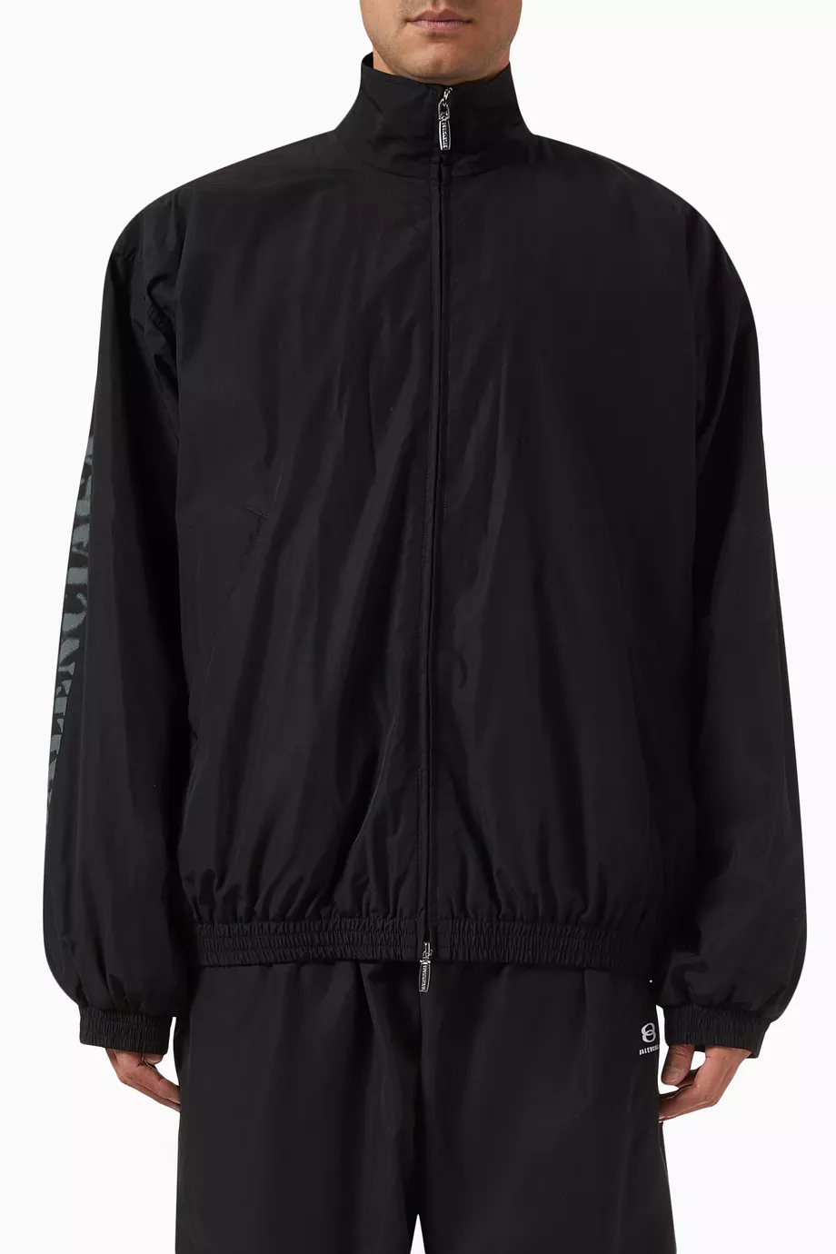 【BALENCIAGA】STENCIL TYPE TRACKSUIT ジャケット Buy Balenciaga Black Stencil Type Tracksuit Jacket in Techno