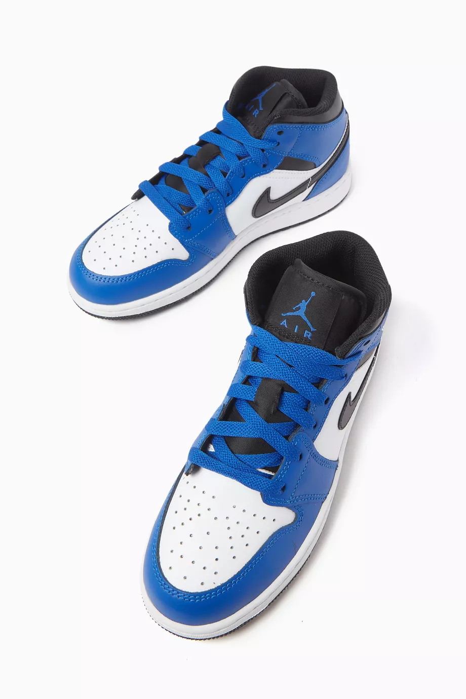 Buy Nike Blue Air Jordan 1 Mid top Sneakers in Leather For Boys Online Ounass Saudi