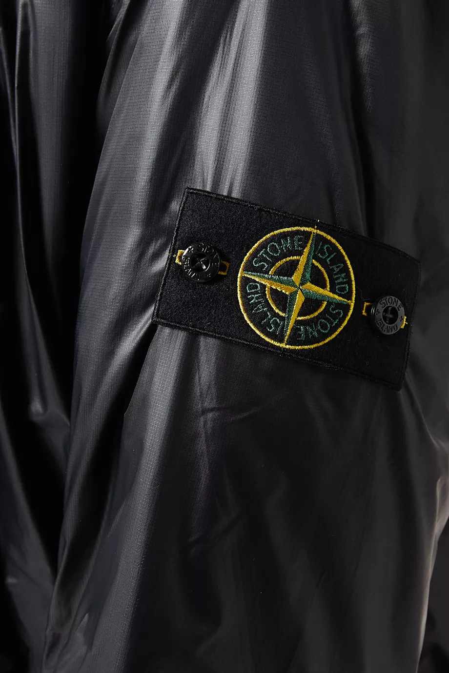 Stone island black shiny jacket on sale