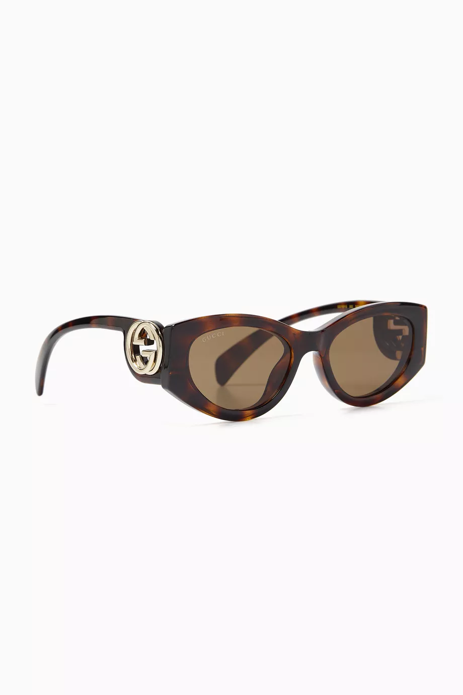 Buy Gucci Brown Oval Sunglasses in Recycled Acetate For Women